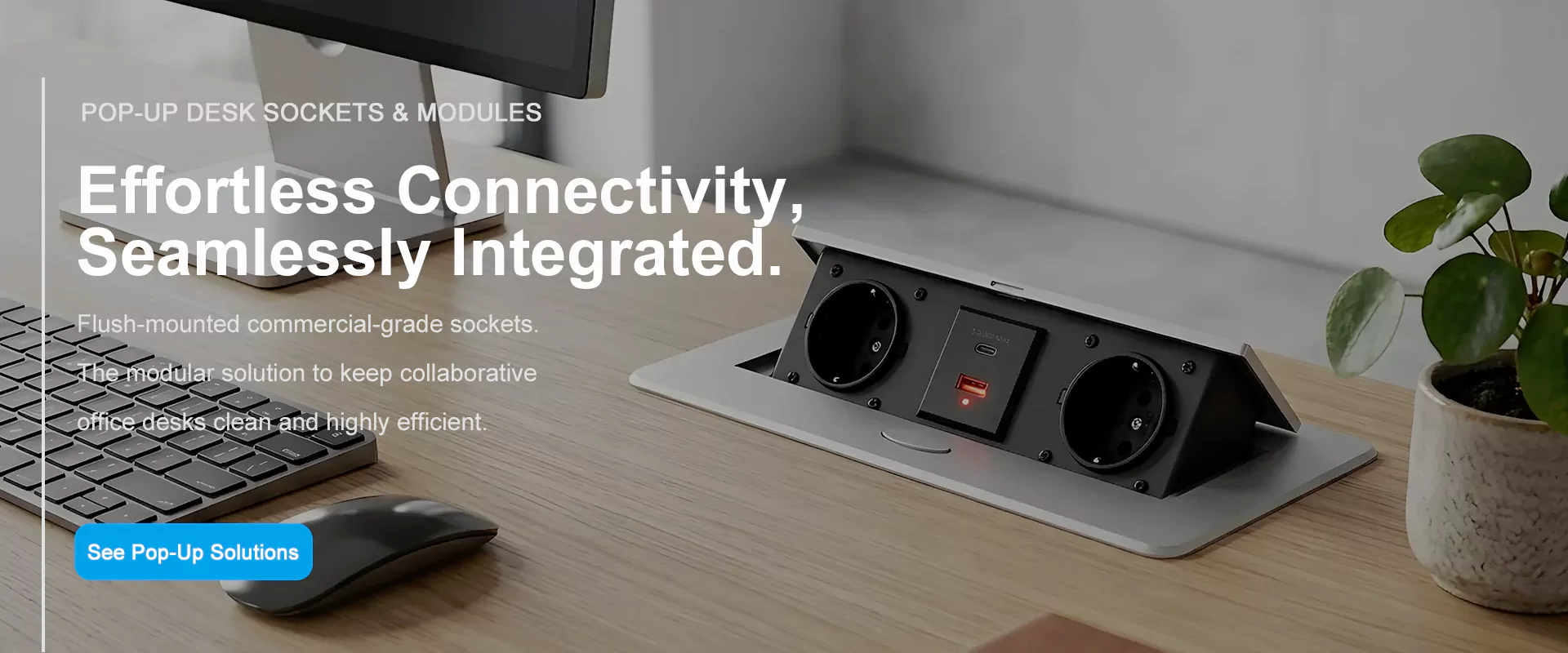 Commercial-grade flush-mounted pop-up desk socket with USB ports and red charging indicator for collaborative workspaces.